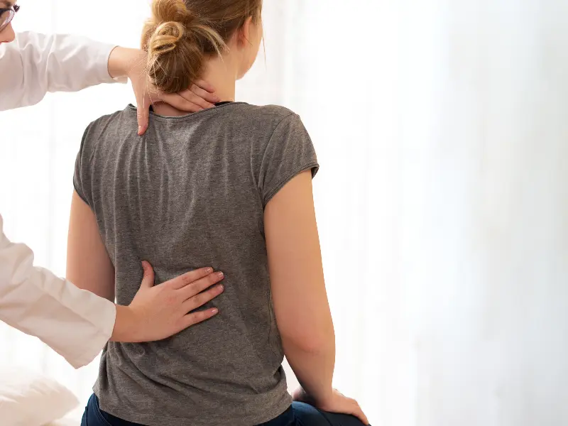Low Back Pain Treatment Near Me in Champlin, MN. Chiropractic Exam For Low Back Pain Relief.